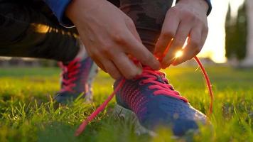 Running shoes - woman tying shoe laces video