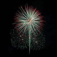 fireworks in the dark sky background photo