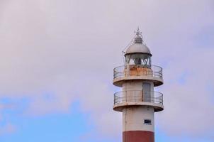 White and red lighthouse photo