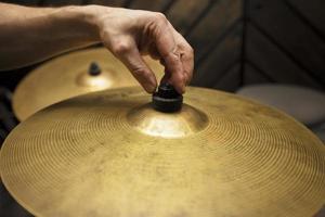 Copper musical plate from a drum kit. photo