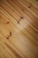 Close-up diagonal texture of a wooden floor. photo