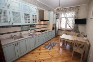 Small kitchen in a cramped apartment.Kitchen room in a Russian prefabricated house. photo