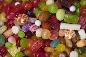 Many sweets. Multi-colored caramel close-up. Background sweets. photo