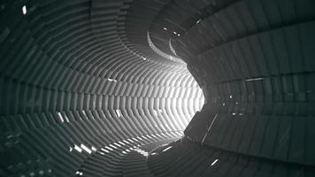 Futuristic tech motion background animation - interior of a shiny revolving tunnel. video