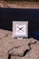 Clock on a rock photo