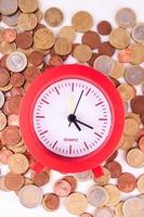 Clock and coins photo