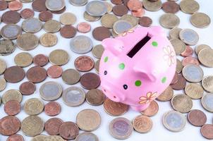 Piggy bank and coins photo