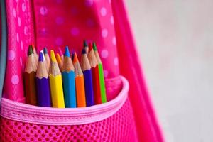 colored pencils in backpack photo