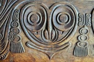 Old carved wooden board photo