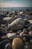 Pebble stones on the beach - soft focus with vintage filter photo