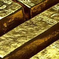 Close-up gold bullion are rectangular blocks, photo