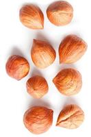 Top view of shelled hazelnuts isolated on white photo