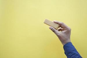 holding a protein bar top view photo