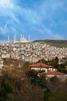 High view of mosque and residences in Istanbul city photo