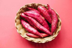 Close up of raw sweet potato in a bowl photo