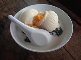 Bubur Ketan Hitam or black sticky rice porridge photo