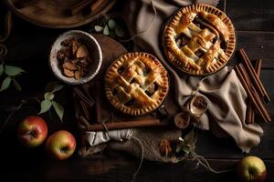 Homemade apple pie. Homemade Apple Pies on wooden background, top view. Classic autumn Thanksgiving dessert - organic apple pie. photo