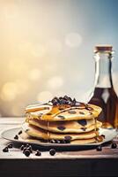 Syrup is poured down and chocolate chips are on top tall stack of golden pancakes layered on a plate with melted butter and syrup dripping down the sides of the stack. . photo