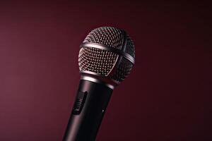 Close-up microphone. microphone isolated on vibrant background, banner with copy space. . photo