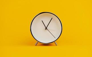 white clock on yellow background concept of time Time planning photo