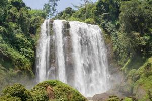 Landscape photo of great water fall on the travel destination Semarang Central Java. The photo is suitable to use for adventure content media, nature poster and forest background.