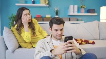 The young woman is very angry with her phone-addicted husband and wants to spend time alone together. video