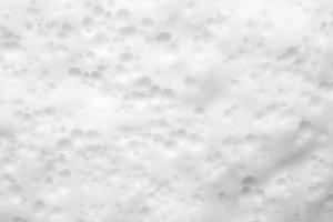 Abstract white soap foam bubbles texture background photo