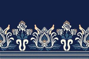 Ikat floral paisley embroidery on navy blue background.Ikat ethnic oriental pattern traditional.Aztec style abstract vector illustration.design for texture,fabric,clothing,wrapping,decoration,sarong.