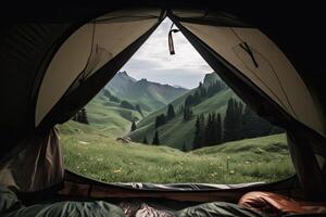 Amazing view from inside tent to mountain landscape. Camping during hike in mountains, outdoor activities. Created with photo