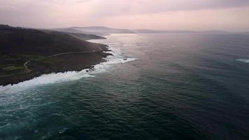 Idyllic View Of Beach Caion With Frothy Waves Onto Shoreline In Coruna, Spain. Aerial Wide Shot video