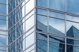 corner of glass business center building, urban architecture background photo