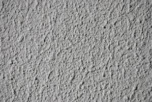 rough unsmooth grain grey cement wall texture photo