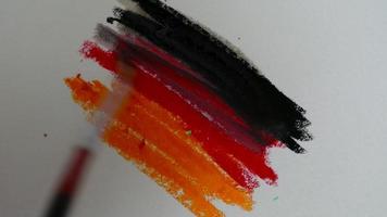Process of drawing the flag of Germany with pastel pencils video