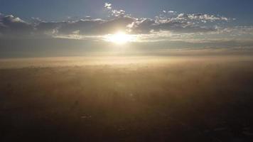 Aerial view of foggy hills covered by forest. Beautiful landscape in the mountains at sunrise. Colourful sunrise in forested mountain with fog. Morning dawn in the mountains. video