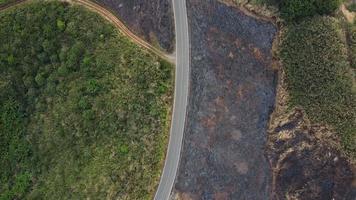 Mountain destroyed by human for cultivate plants. Aerial view of mountains covered in haze from burning forests. Areas with dense smog and covered with PM2.5. Air pollution and ecological problems video