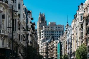 View of Gran Via, main shopping street in Madrid, Spain photo