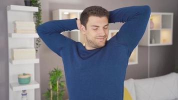 Underarm sweat smell. The man with sweaty armpits is disgusted by the smell and is uncomfortable. video