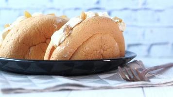 Pasty cream cake on plate on table video