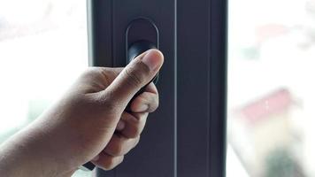 male hand pulls a door handle video