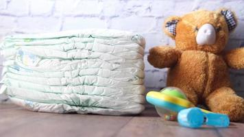 Stack of baby diaper on table video