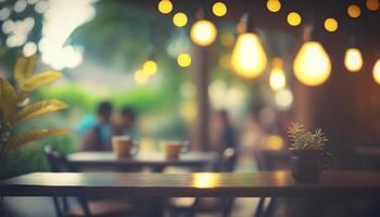 Blurred background - coffee shop in garden blur background with bokeh. photo