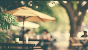 Blurred background - coffee shop in garden blur background with bokeh. photo