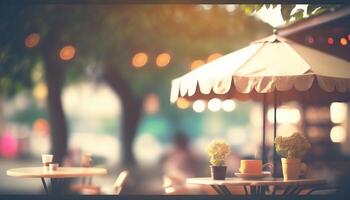 Blurred background - coffee shop in garden blur background with bokeh. photo