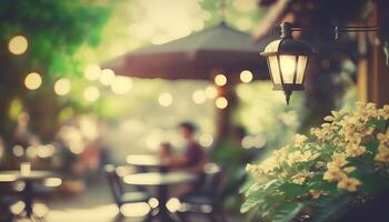 Blurred background - coffee shop in garden blur background with bokeh. photo