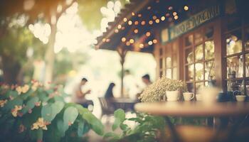 Blurred background - coffee shop in garden blur background with bokeh. photo