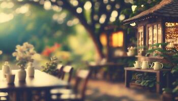 Blurred background - coffee shop in garden blur background with bokeh. photo