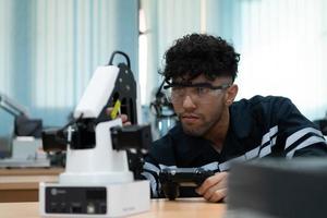 Students studying robotic hand technology are learning how to construct robotic hands for a range of industrial uses. photo
