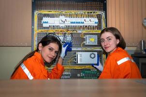 The circuit boards and sensors of a robotic hand are designed by a robotics engineer. in the Robotics Institute Research Center photo