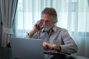 A successful entrepreneur Spends all of his time working, even on vacation, and works his entire life without thinking about retiring. photo