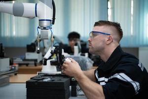 Students studying robotic hand technology are learning how to construct robotic hands for a range of industrial uses. photo